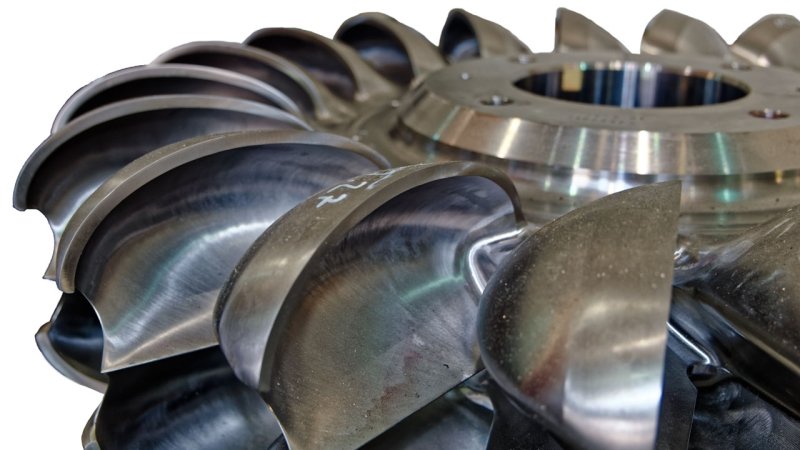 A detail of the spoon-shaped buckets of a Pelton turbine runner. (Source: © hajes / stock.adobe.com)