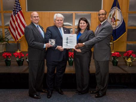 Representatives of the NRC receive NuScale's application for the certification of its small modular reactor design. (Source: Wikipedia.org)
