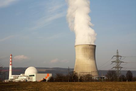 The power plant's cooling-water system removes heat from the condenser, where steam leaving the turbine is condensed back into water. The heat is then released into the atmosphere through the cooling towers. (Source: © Massimo Cavallo / stock.adobe.com)