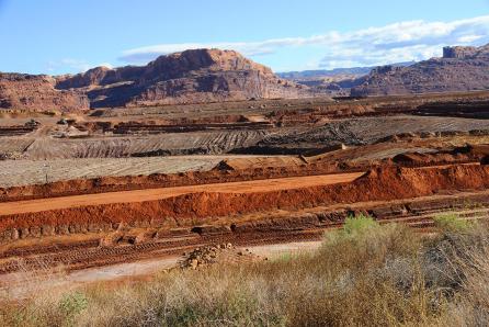 Large volumes of waste are generated by uranium mining and processing, mainly as waste rock and mill tailings. These materials contain naturally occurring radionuclides and require appropriate management. (Source: © Gary Whitton / stock.adobe.com)