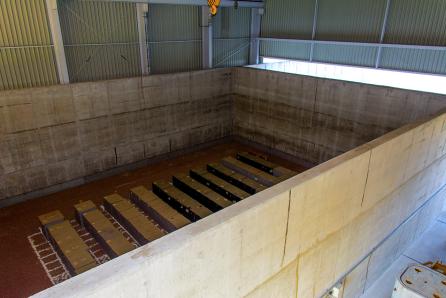 Engineered disposal facilities provide long-term isolation of radioactive waste using reinforced concrete structures and multiple safety barriers. (Source: © serg11111 / stock.adobe.com)