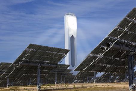 An array of heliostats continuously concentrates sunlight onto the receiver at the top of the tower.