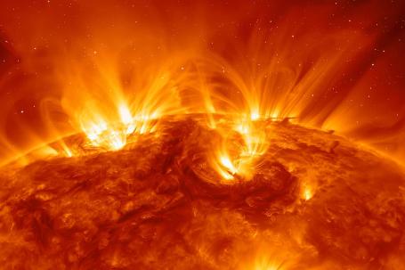 Protuberances (enormous clouds of plasma ejected into the surroundings) can be observed on the surface of the Sun.