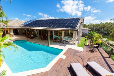 A large array of unglazed solar collectors used for heating water in a swimming pool.