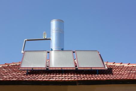 Solar thermal collectors connected to a hot-water storage tank.