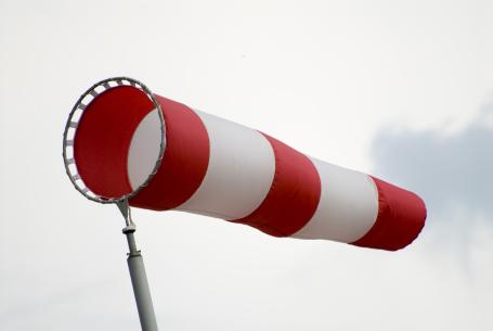 A windsock is used at airfields and roads to determine the approximate direction and strength of the wind.