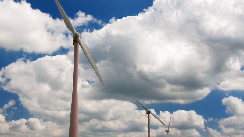 A two-bladed horizontal-axis wind turbine in a farming region of the Netherlands. (Source: © Ivonne Wierink / stock.adobe.com)